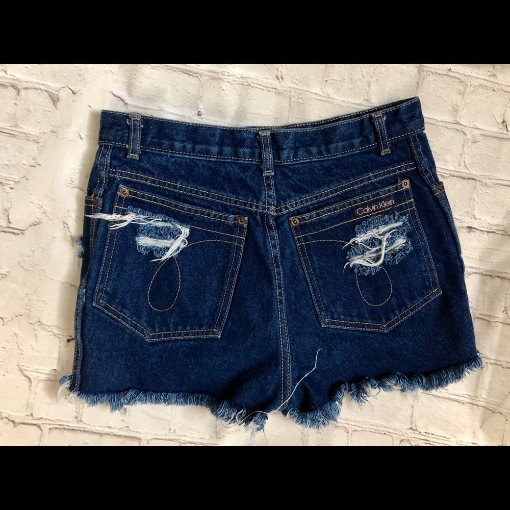 VINTAGE HIGH WAISTED CALVIN KLEIN CUTOFFS